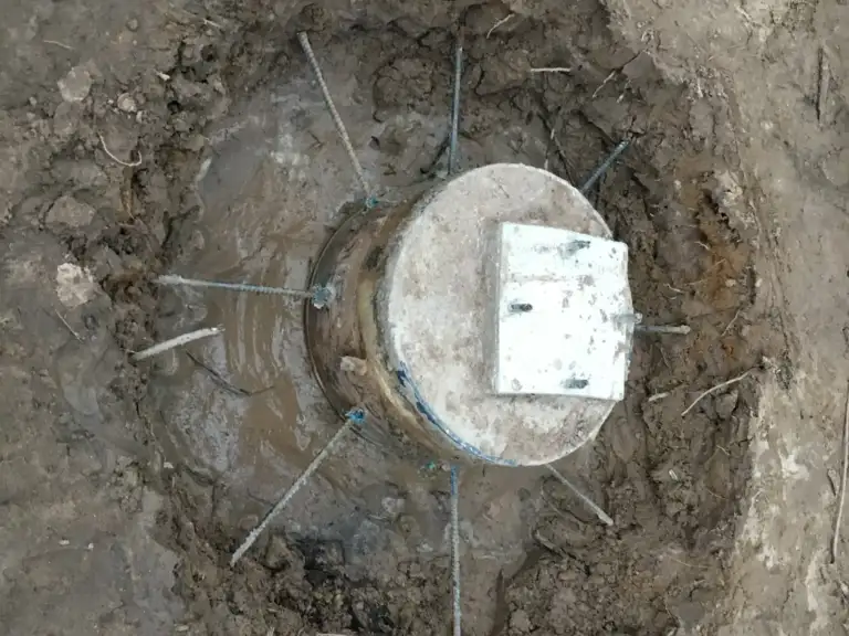 Top of a Ty-Rite anchor in a fresh concrete footing